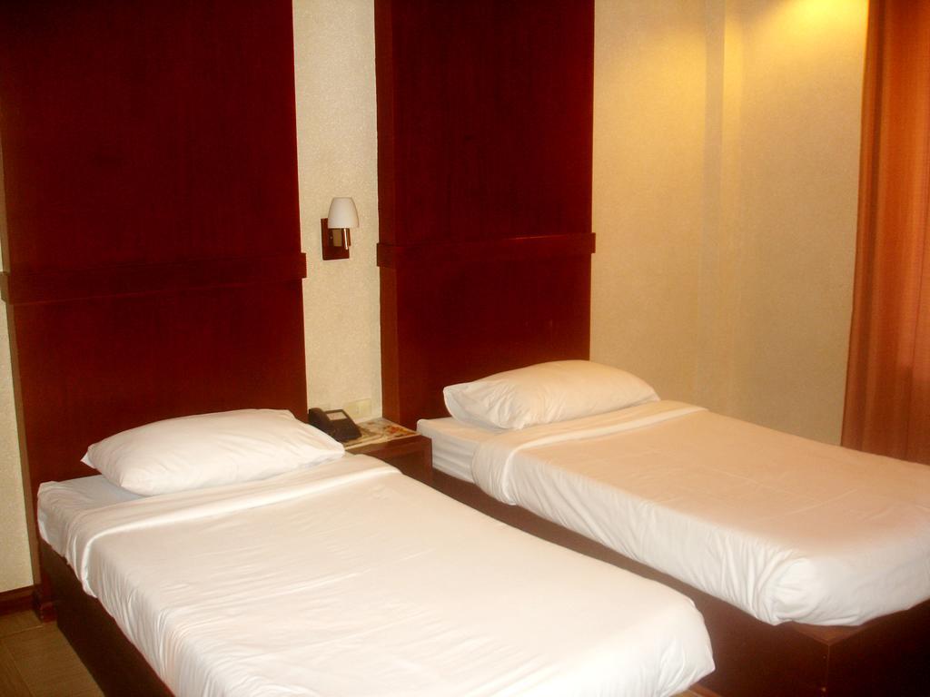 Roxas Midtown Hotel Kamer foto