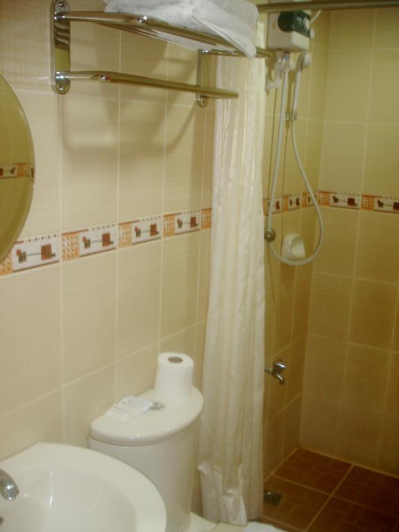 Roxas Midtown Hotel Kamer foto