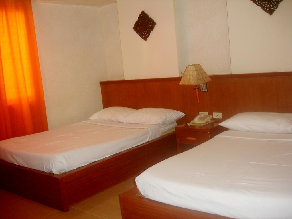 Roxas Midtown Hotel Kamer foto